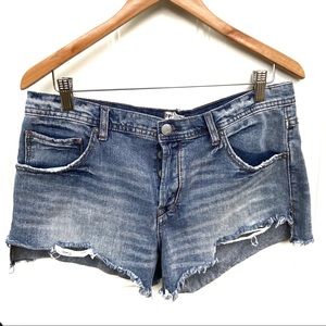 Free people distressed shorts. Size 30.
